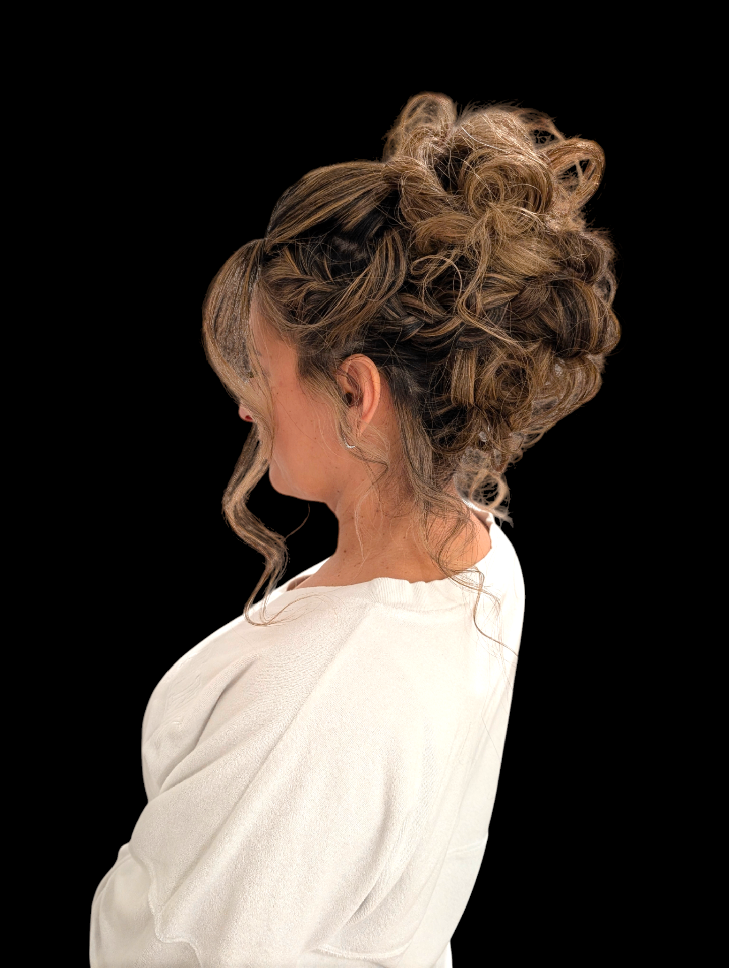 Textured curly high updo with braided details by Hair By Sess