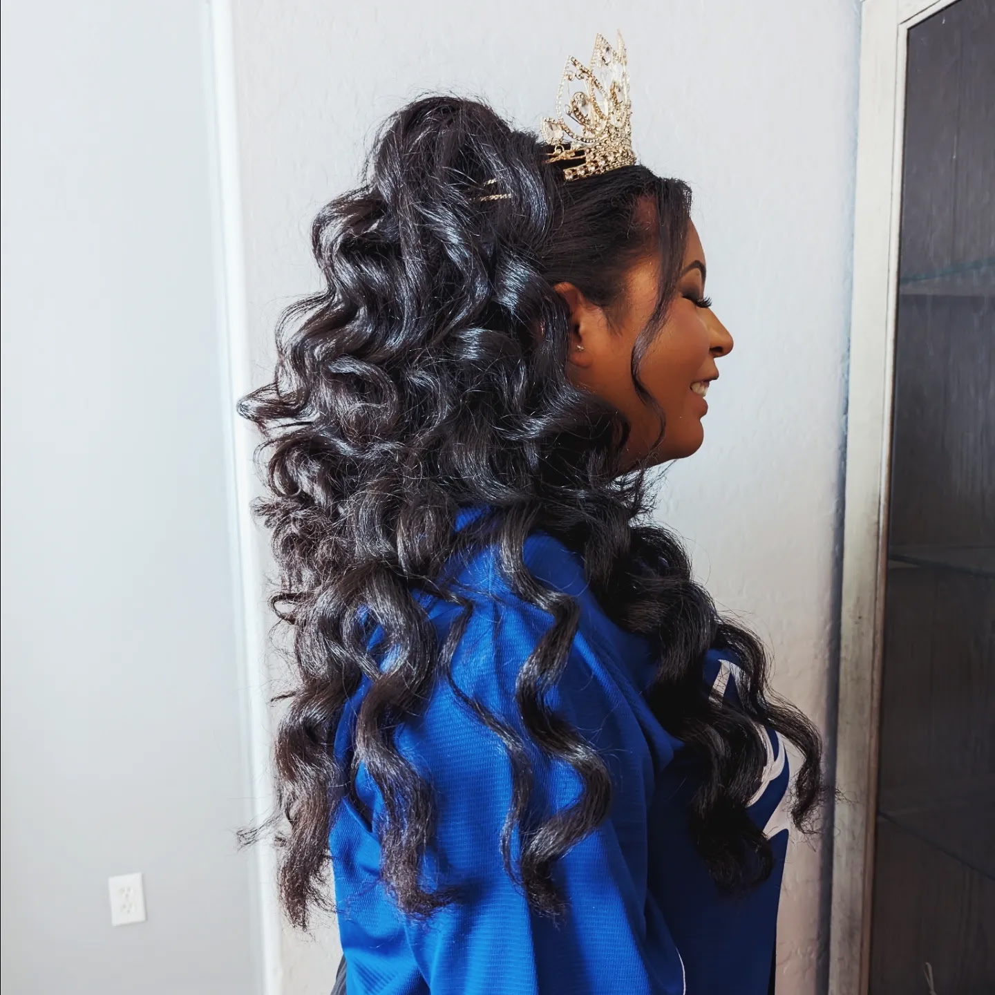 Pageant half-up curls styled with a crown by Hair By Sess