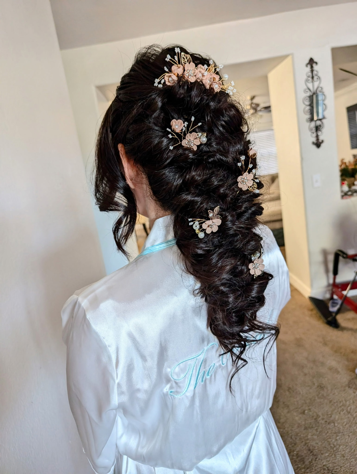 Bridal boho braid with blush floral pins by Hair By Sess